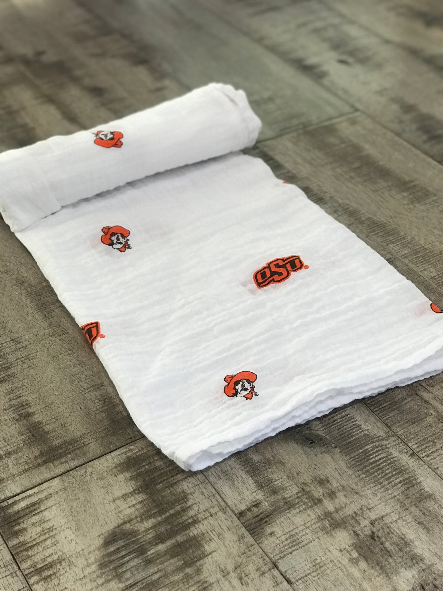 Oklahoma State University Cowboys Muslin Swaddle Blanket – Soft Breathable 47x47 Baby Blanket | Officially Licensed OSU Gift